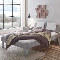 Bett in Betonoptik mit Kopfteil Kissen - Rienas