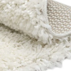 Cremefarbener Teppich mit hohem Flor - Vacance