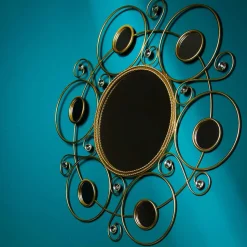 Designer Spiegel aus Metall in Gold - Vurian