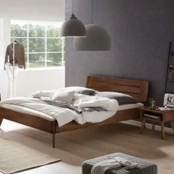 Dunkles Holzbett aus Nussbaum Massivholz - Vetonia