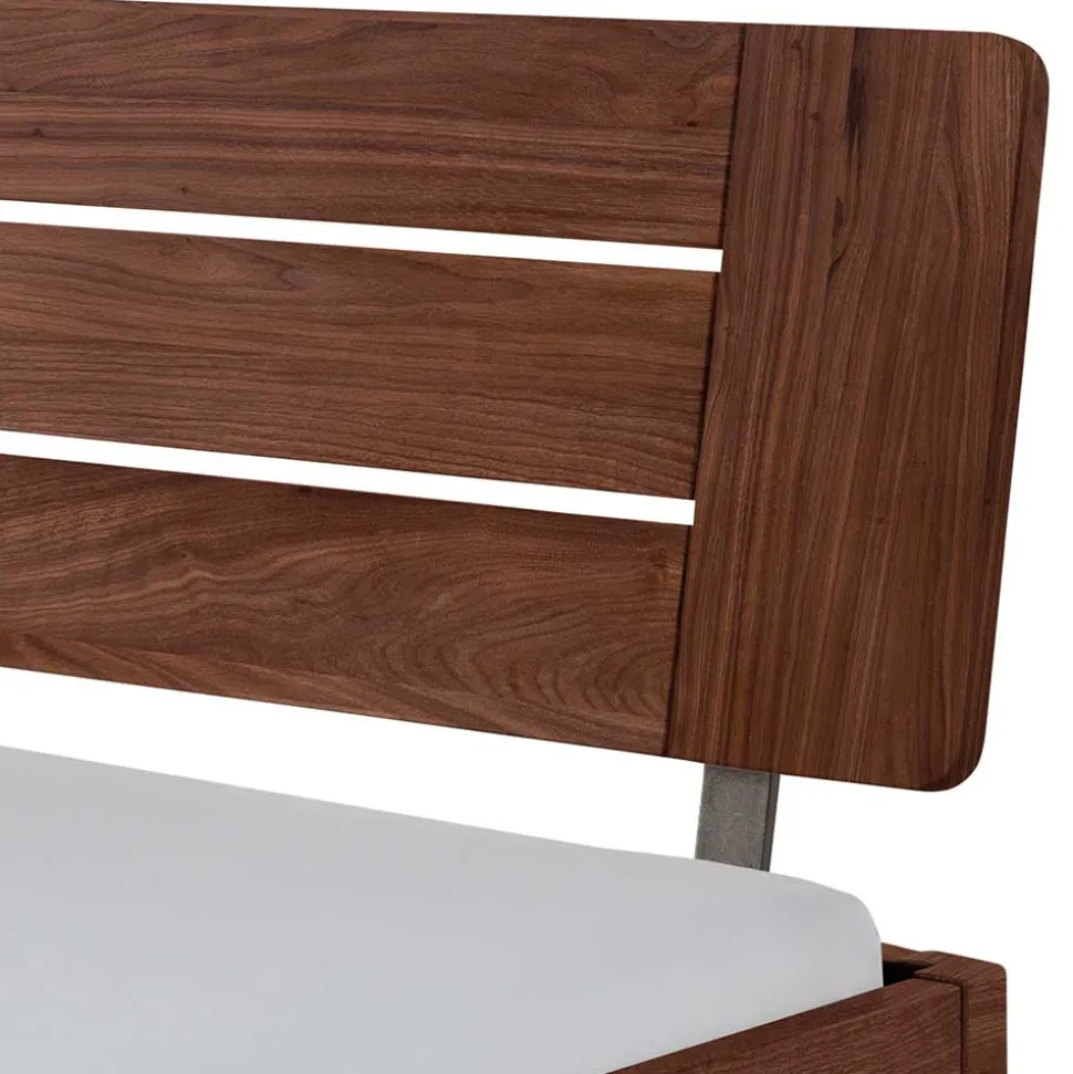 Dunkles Holzbett aus Nussbaum Massivholz - Vetonia