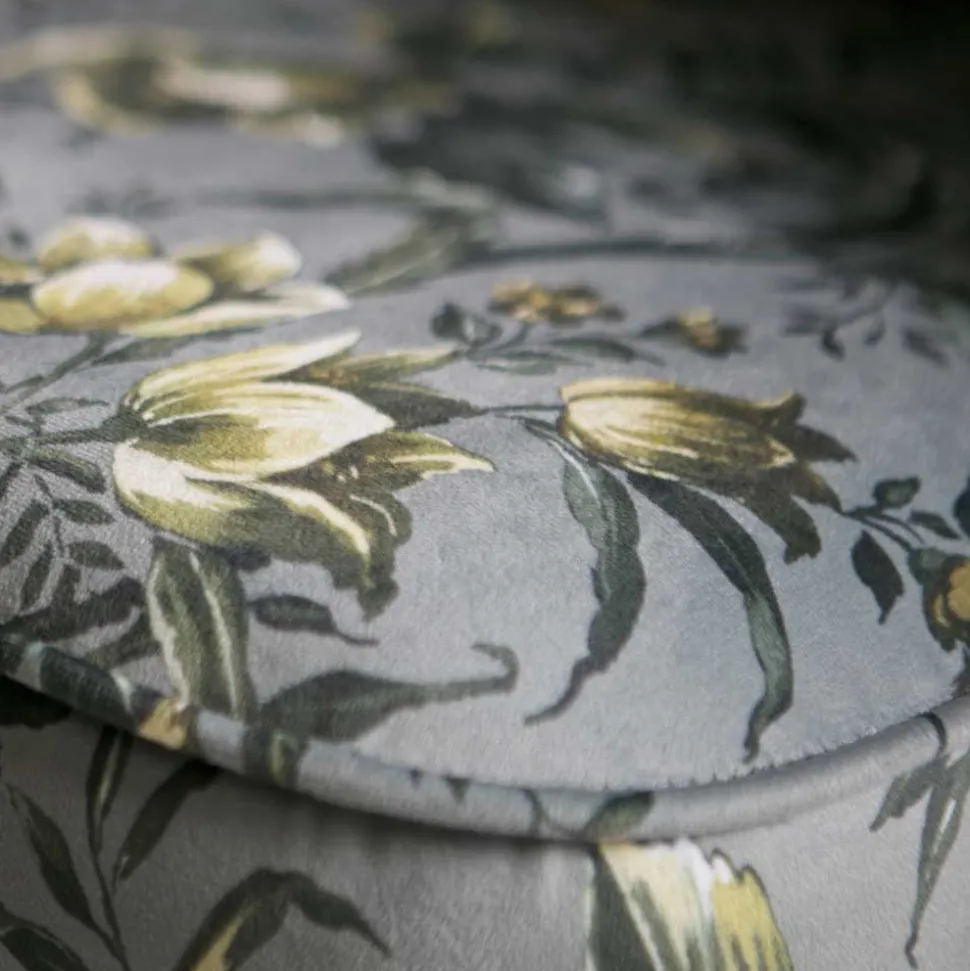 Grauer Polstersessel mit Blumen Muster Melissa im Retro Look