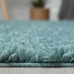 Hellblauer Teppich mit hohem Flor - Saracan