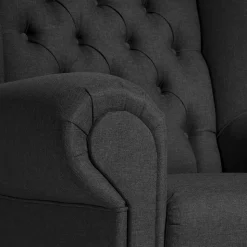 Ohrenbackensessel mit Federkern in Schwarz - Jon