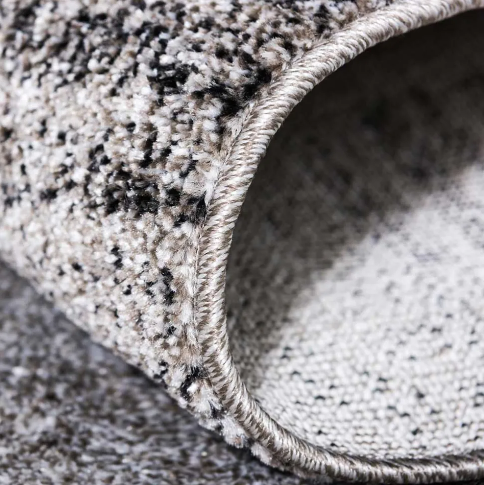 Teppich in Hellgrau mit dunkelgrauem Rand - Armina