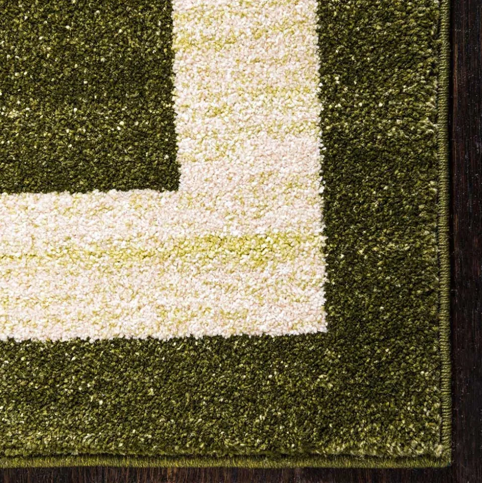 Teppich in Oliv Grün mit Rahmen in Creme - Loritana